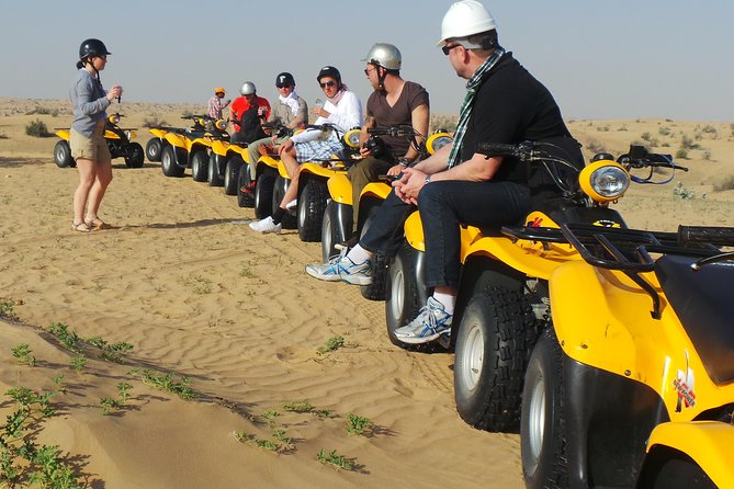 Dubai Desert Afternoon Quad Safari With Camel Ride, BBQ Dinner and Belly Dancing