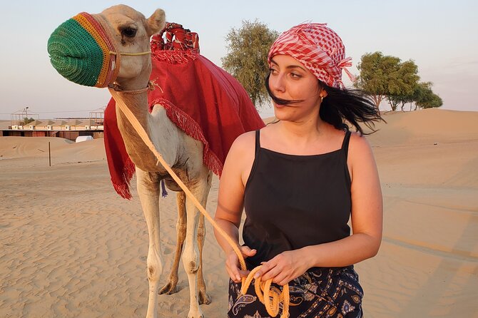 1 dubai desert safari bbq camel ride sandboarding Dubai Desert Safari, BBQ, Camel Ride & Sandboarding