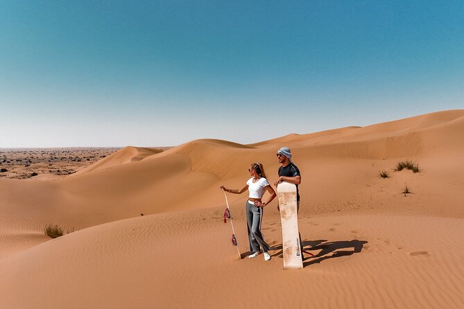 1 dubai desert safari camel ride sandboarding bbq soft drinks Dubai Desert Safari: Camel Ride, Sandboarding, BBQ & Soft Drinks
