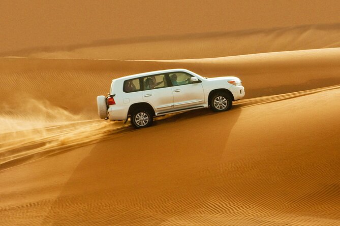Dubai Desert Safari With BBQ Dinner, Dune Bashing & Live Show