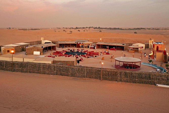 1 dubai evening desert safari camel ride sandboarding bbq dinner Dubai Evening Desert Safari, Camel Ride, Sandboarding & BBQ Dinner