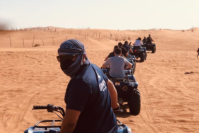 Dubai Red Dunes Quad Bike Tour,Sandboard, Camel Ride & BBQ Dinner