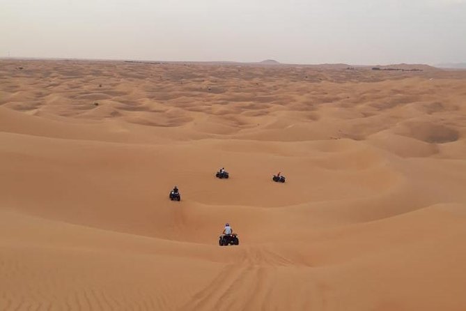 Dubai: Unique MORNING Quad Bike Red Dunes Safari