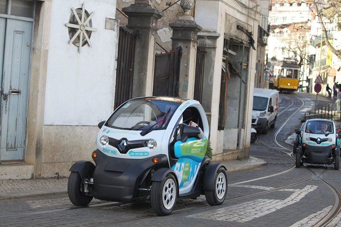 Electric Car With GPS Audio Guide Full Day Tour in Lisbon