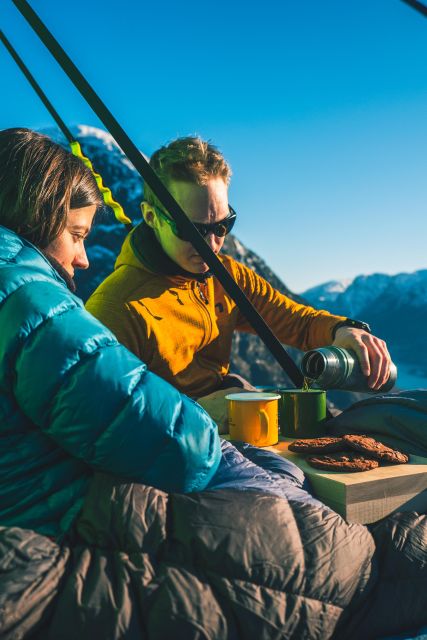 1 enjoy a cliff picnic in the fjord landscape of norway Enjoy a Cliff Picnic in the Fjord Landscape of Norway