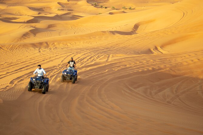 1 evening desert safari with quad bike bbq dinner and camel ride Evening Desert Safari With Quad Bike, BBQ Dinner and Camel Ride