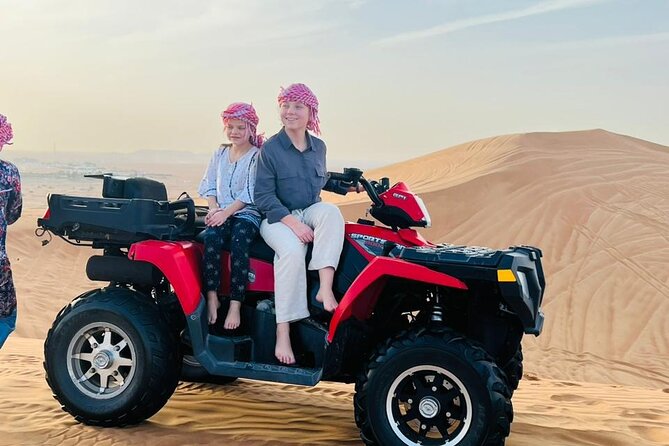 Evening Desert Safari With Quad Bike & BBQ Dinner/ Camel Trekking/ Sand Surfing