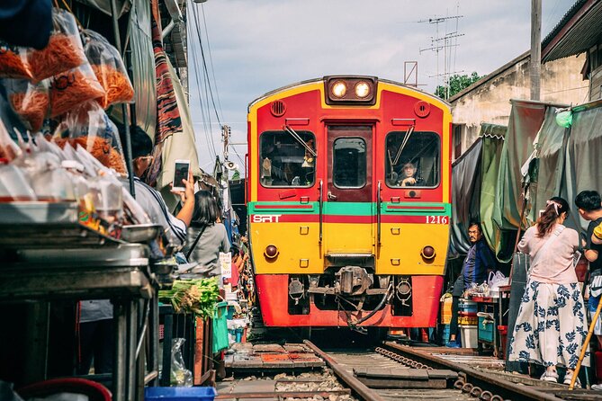 Maeklong Railway & Damnoen Saduak Floating Market Tour – Full Day