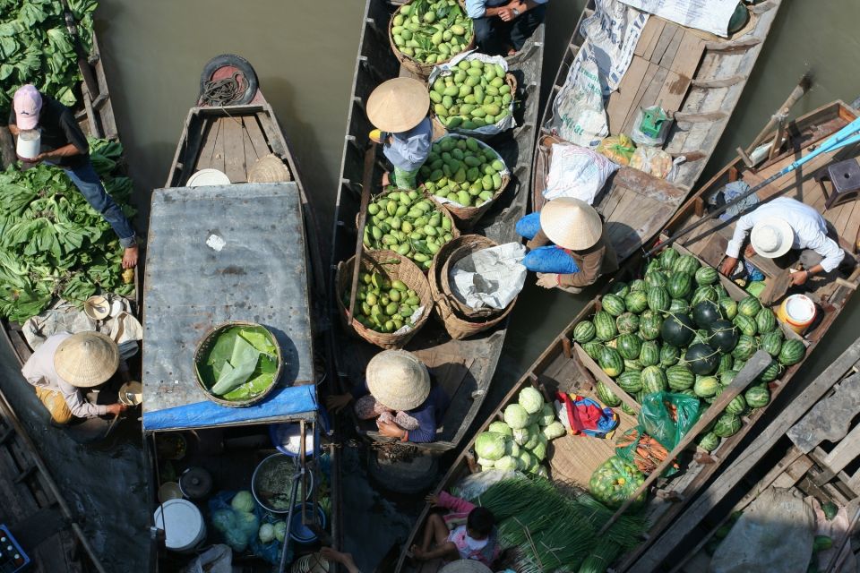 1 mekong day tour by carcai be market local island cycling Mekong Day Tour by Car:Cai Be Market, Local Island & Cycling