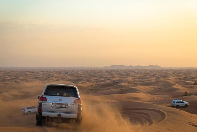 Morning Desert Safari Dubai:Red Dunes Desert,Camel Ride,Sand Boarding (Private)