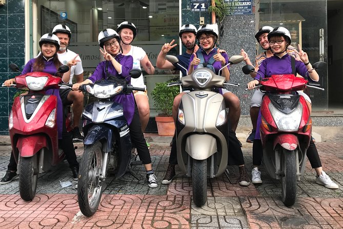 Private Ho Chi Minh Street Food Tour by Motorbike With Ao Dai Female Rider