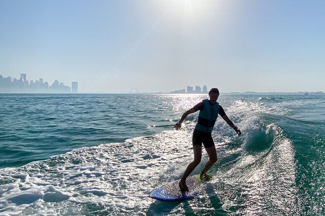 Private Wakesurfing or Wakeboarding Along Dohas Skyline