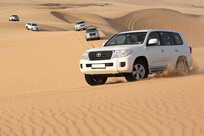 Red Dunes Desert Safari Dubai With Buffet Dinner, Sand Boarding and Shows