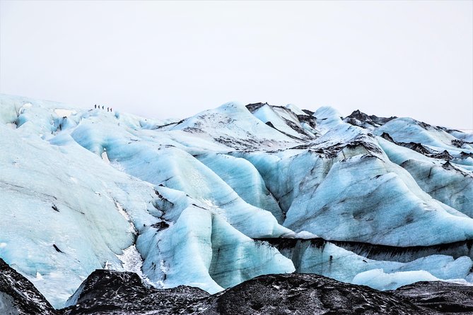 South Coast Highlights & Glacier Hiking Small Group Tour From Reykjavik