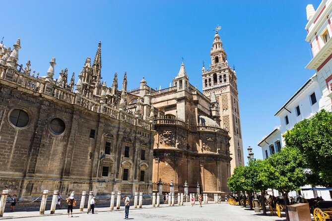 2-Day Guided Tour Caceres & Sevilla From Madrid by Bus and High Speed Train - Key Points