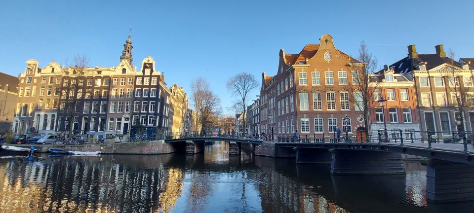 Amsterdam: Layover Sightseeing Tour With Airport Transfer - Highlights