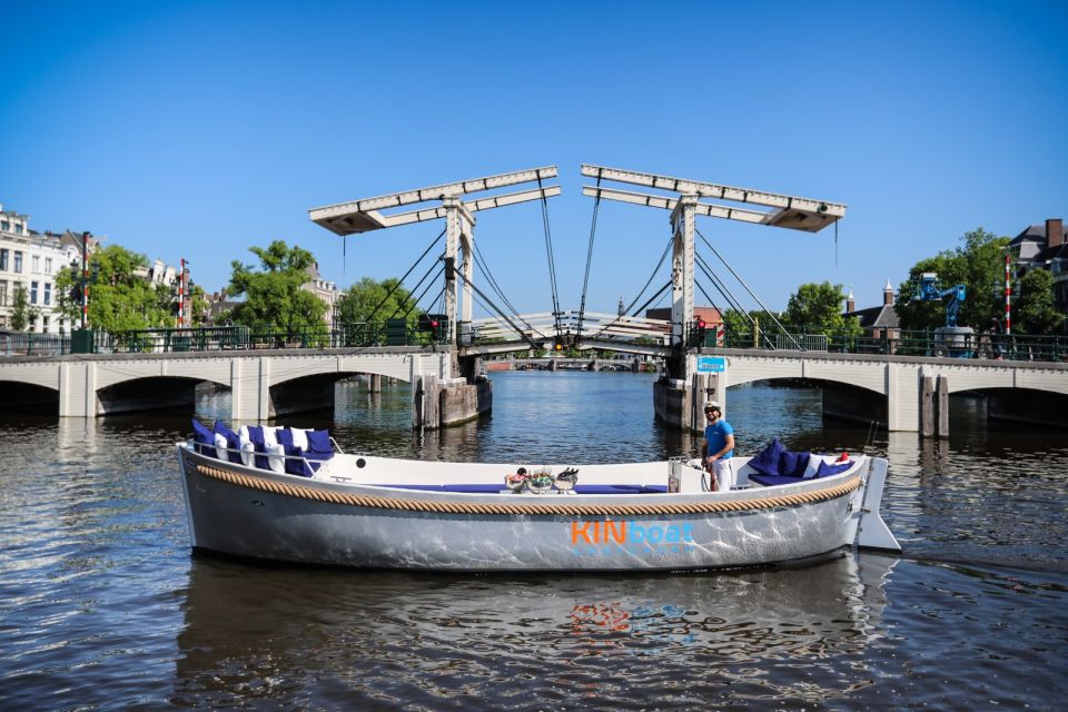 Amsterdam: Open Boat Canal Cruise With Local Guide - Highlights of the Activity