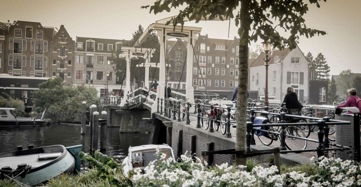 Amsterdam: Sightseeing Bike Tour With a French Guide - Discover Famous and Hidden Gems