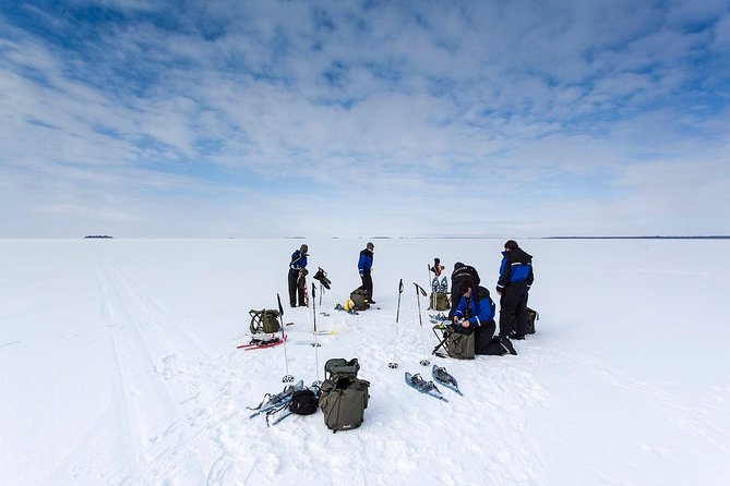 Arctic Day With Ice Fishing and Floating - Snowshoeing Adventure