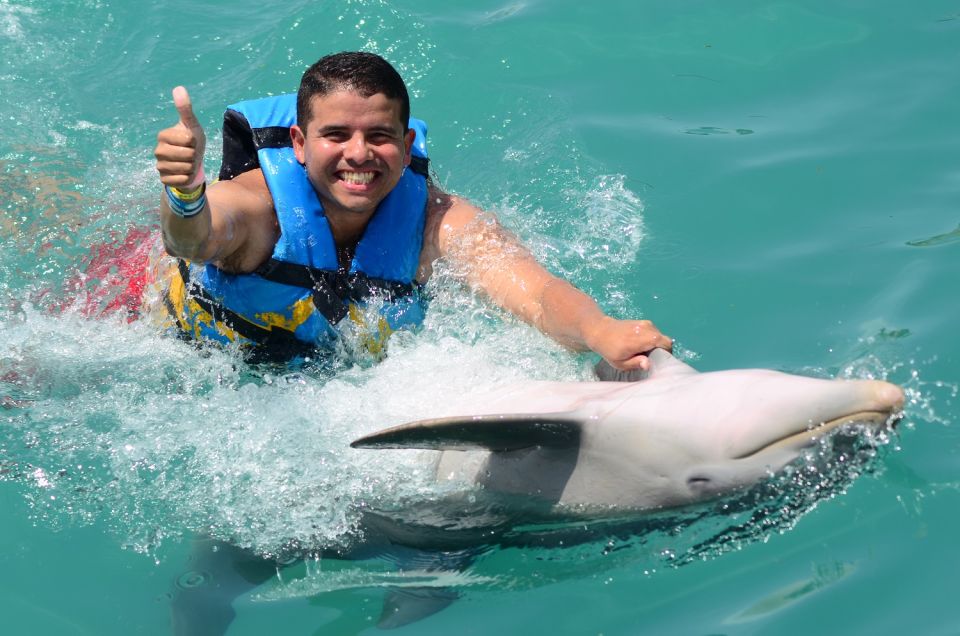 Cancún: Dolphin Swimming Program on Isla Mujeres With Buffet - Experience Highlights