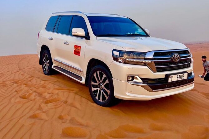 Desert Safari Dubai Red Dunes Safari With Live BBQ Buffet Dinner - Indulge in Sandboarding and Camel Rides