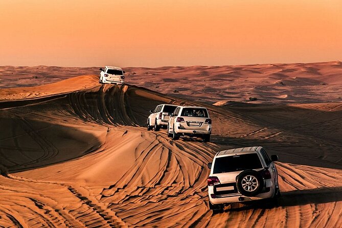 Desert Safari Dubai With Camel Ride,Sand Boarding & Buffet Dinner - Thrilling Sand Boarding Adventure