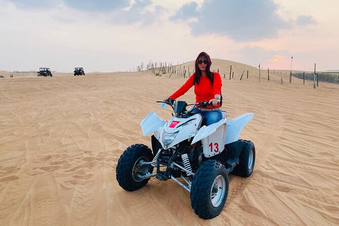 Dubai Desert Quad-Bike Safari With BBQ Dinner and Camel Ride - Experience Highlights