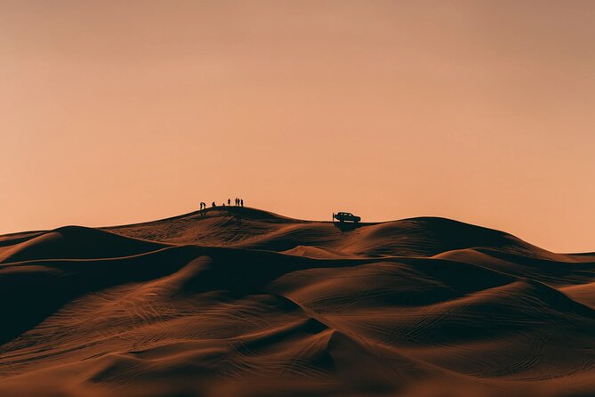 Dubai: Desert Safari 4x4 Dune With Camel Riding and Sandboarding - Try Sandboarding on the Dunes