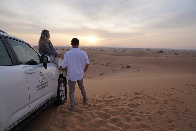 Dubai Desert Safari: Camel Ride, Sandboarding, BBQ & Soft Drinks - Experience Highlights
