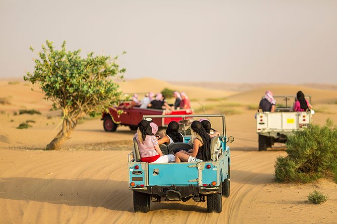 Dubai Heritage Land Rover Desert Safari With Traditional Dinner - Pricing and Duration