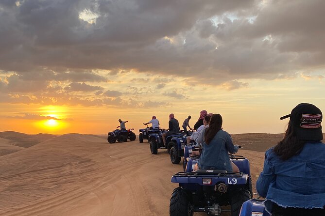 Dubai Red Dunes Quad Bike Safari, Camels, Sandsurf & Refreshment - Enjoy Sandsurfing in the Desert