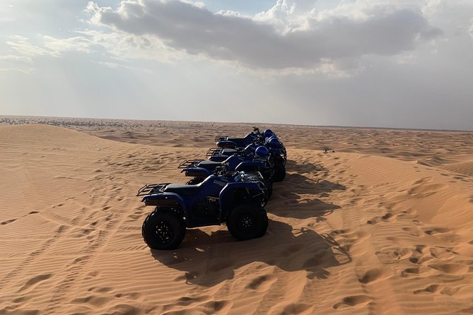 Dubai: Unique SUNSET Quad Bike Red Dunes Safari - Activities and Experience