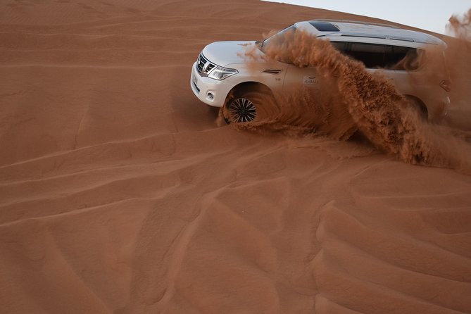 Dune Bashing With Quad Bike and Sand Boarding From Dubai - Tour Inclusions