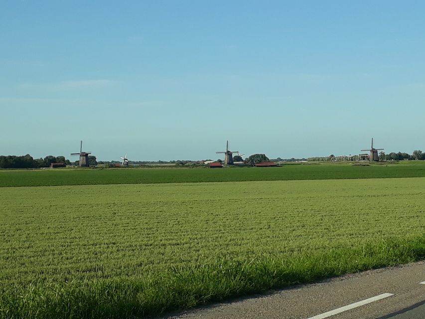 From Amsterdam: Zaanse Schans Windmills Private Tour - Experience Highlights