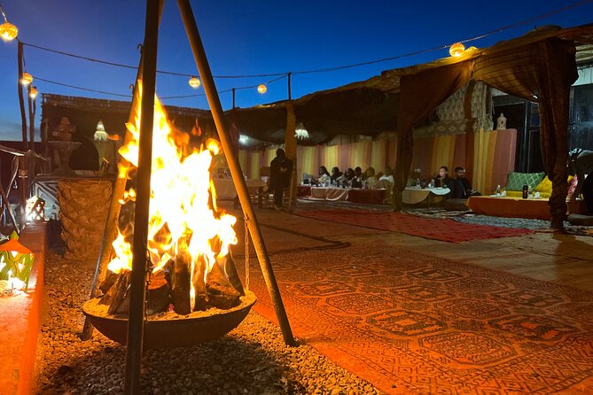 From Marrakech : Agafay Desert Camel Ride at Sunset & Dinner Show - Moroccan Feast Under the Stars