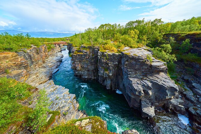 Full-Day Tour in Kiruna City and Abisko National Park With Lunch - Guided Visit to Iron Mine