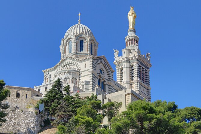 Historical Visit of Marseille With 12 Audioguides on Smartphone - Exploring Marseilles Iconic Landmarks