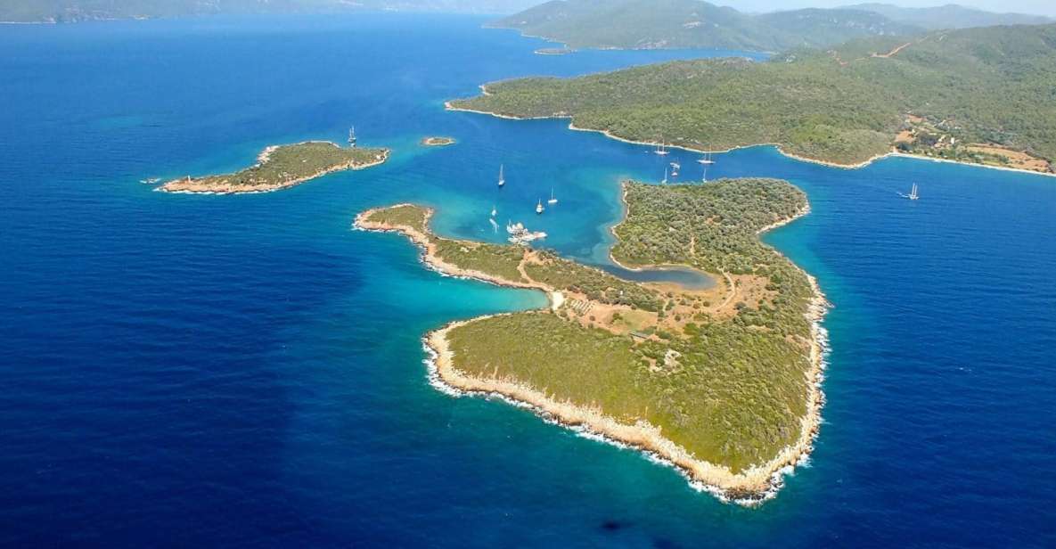 Marmaris: Cleopatra Island Boat Trip With Lunch and Transfer - Activity Duration and Tour Guide