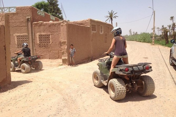 Marrakech Palm Grove ATV and Camel Ride Small Group Tour - Safety Measures and Nomad Attire