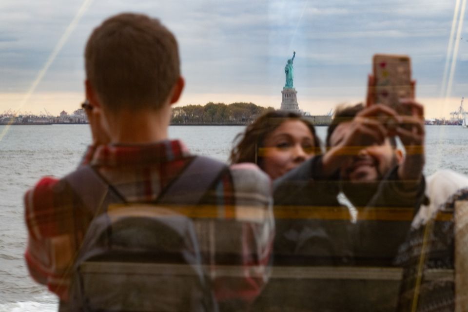 New York City: Guided Highlights Bus Tour and Ferry Ride - Experience Highlights