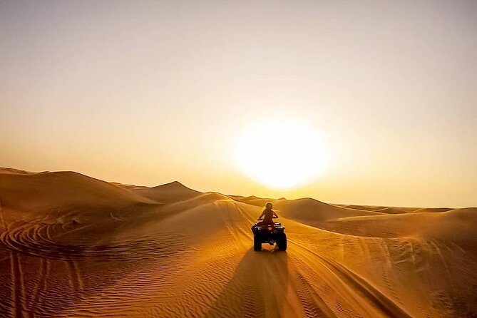 Premium Evening Desert Safari With Quad Bike, Camel Ride and BBQ Dinner - Thrilling Quad Biking in the Dunes