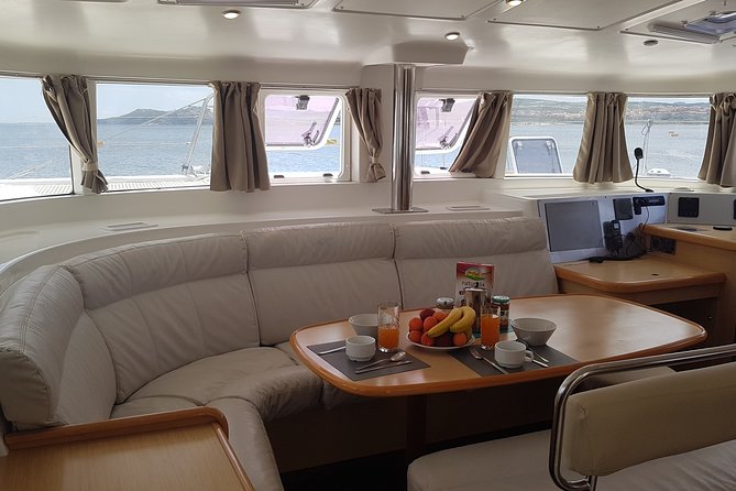 Private Catamaran Tour to the Maddalena Archipelago From Porto Rafael Palau - Boarding Information