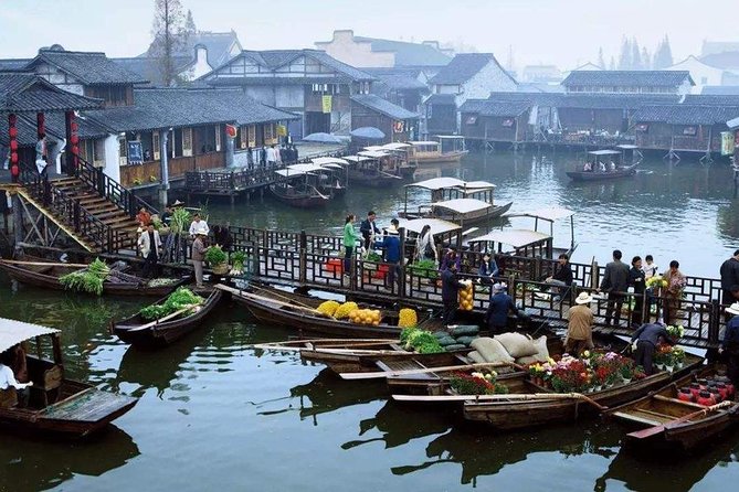 Private Round Transfer to Wuzhen &Xitang Water Town From Shanghai - Cancellation Policy