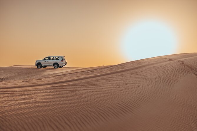 Private Sunset Desert Safari:Sandsurfing, Camel Ride & BBQ Dinner - Sandsurfing Adventure