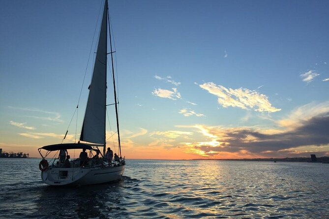 Private Sunset Sailing Tour in Lisbon With Welcome Drink - Experience Highlights