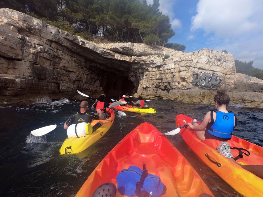 Pula: Sunset Kayak Tour With Snorkeling and Cliff Jumping - Experience Highlights