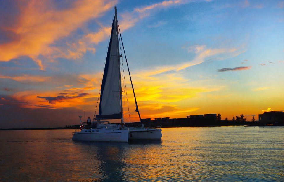 Riviera Maya: Sunset Cruise With Beach Dinner and Open Bar - Experience Highlights