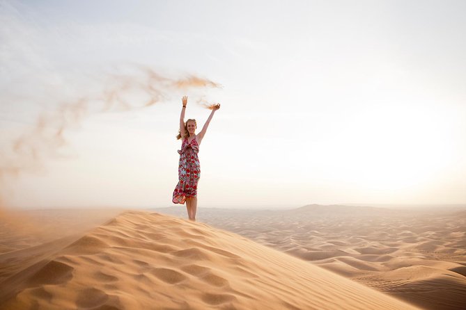 Sharing Afternoon Desert Safari From Dubai With Dinner and Camel Ride - Delight in Traditional Barbecue Dinner