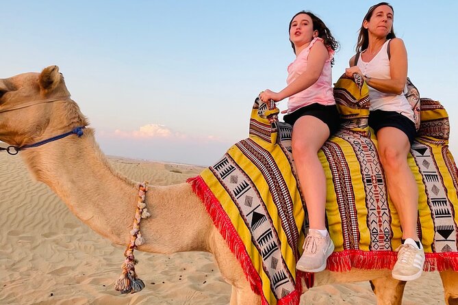 Sunrise Desert Safari With Sand Boarding and Camel Ride - Sand Boarding Thrills