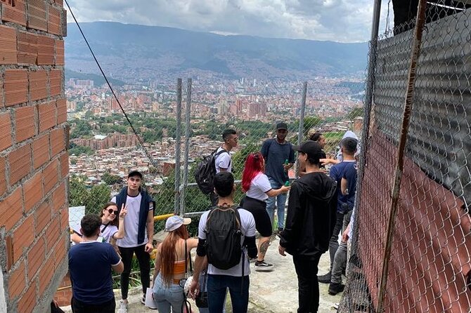 The Real Comuna 13 Graffiti Tour W/ Local Lunch & Beer - Local Guides and Community Interaction